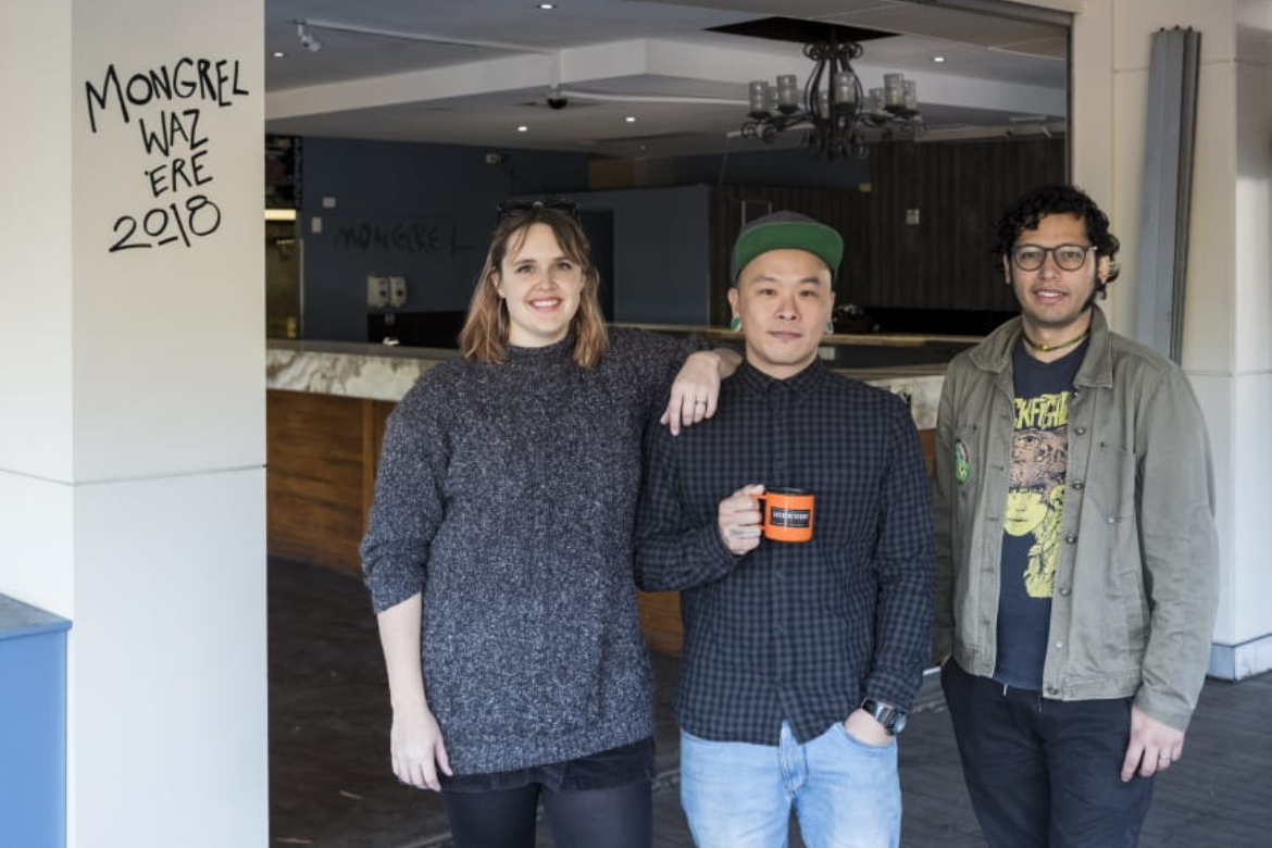Owners Annie Bingley, Henry Wu and Gabriel Escalante-Gafau setting up Mongrel's kennel in 2018.